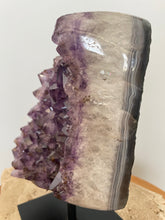 Load image into Gallery viewer, Raw Amethyst cluster with agate edge on stand
