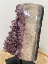 Load image into Gallery viewer, Raw Amethyst cluster with agate edge on stand
