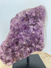 Load image into Gallery viewer, Raw Amethyst cluster with agate edge on stand
